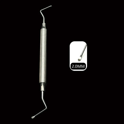 Curette double