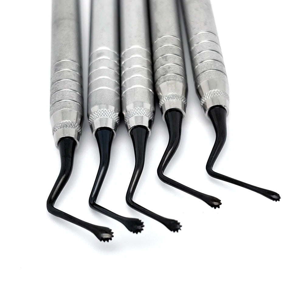 Curette chirurgical crantée double