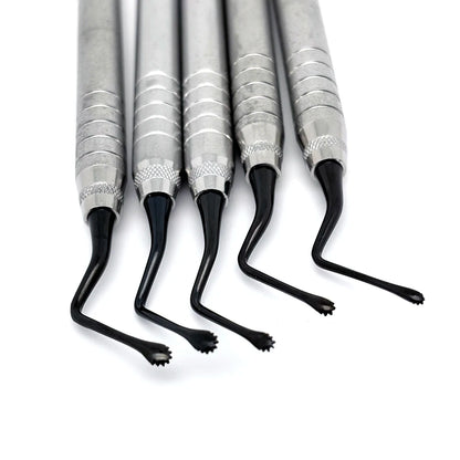 Curette chirurgical crantée double