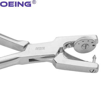 Pince perforatrice à digue